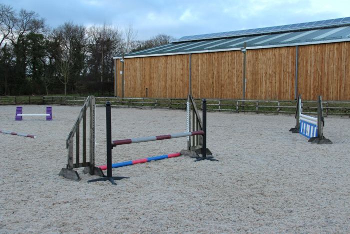 Jumping arena by barn