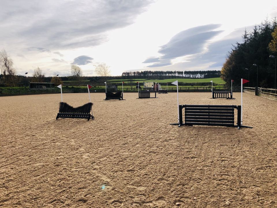 Outdoor arena with jumps