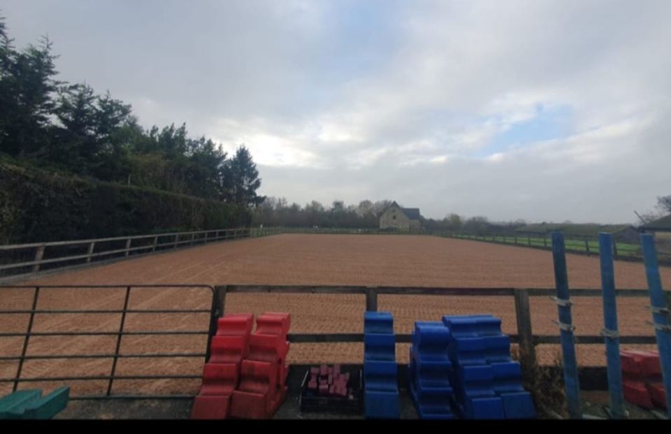 Sand arena with jumps