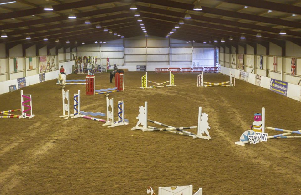 Indoor school with jumps