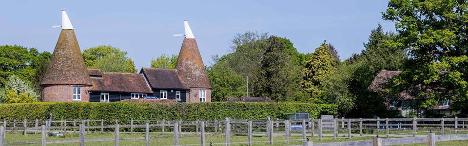 Oast houses and paddock