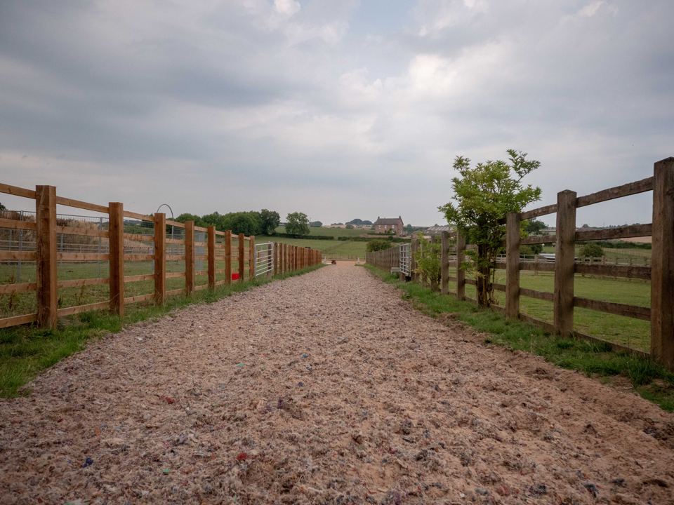 Hacking track along fence