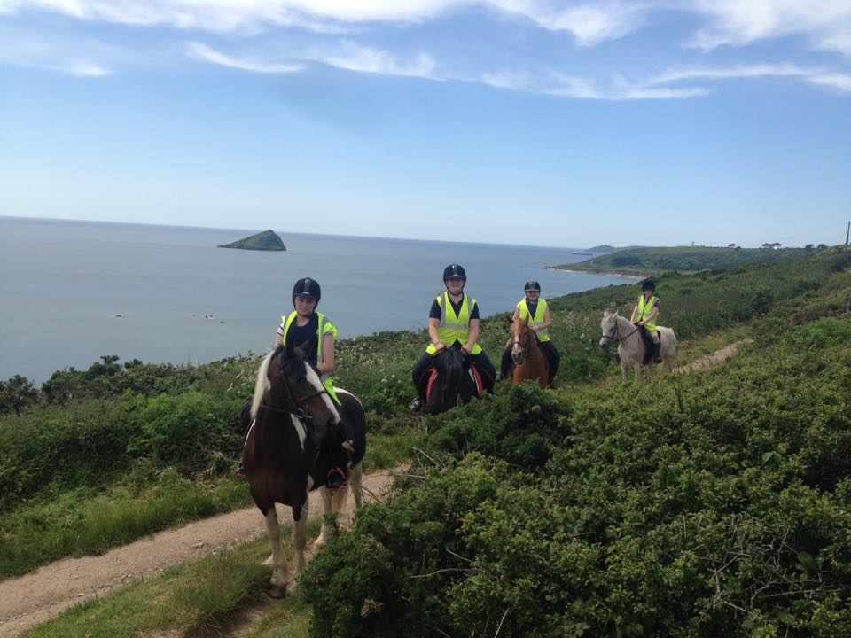 Riders on coast path